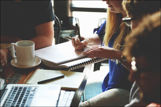 Image of a team of people having a meeting.